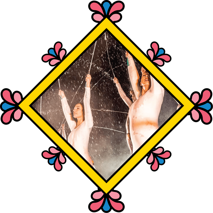 2 gymnasts in placed within a diamond shape artwork